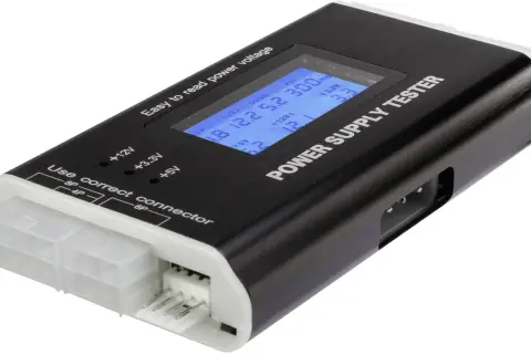 En svart och vit strömförsörjningstestare med en blå digital display som visar spänningsvärden. Perfekt för att snabbt utföra ett psu test.