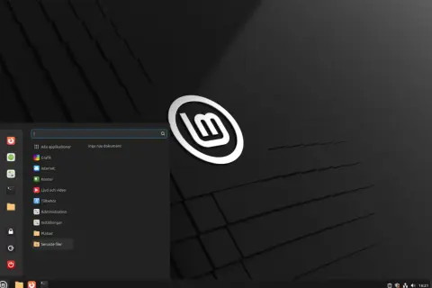 Linux operativsystem med en meny som visar applikationer som Grafik, Internet och Kontor.