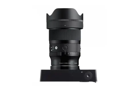 Svart objektiv, Sigma 35mm 1:1.4 DG DN Art, monterat på en svart kamerakropp. Perfekt för att fånga detaljer med sina l mount lenses.