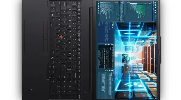 Svart laptop med tangentbord och skärm som visar kod och ett lager med lådor. En funktion för hot swap kan vara användbar för snabba byten.