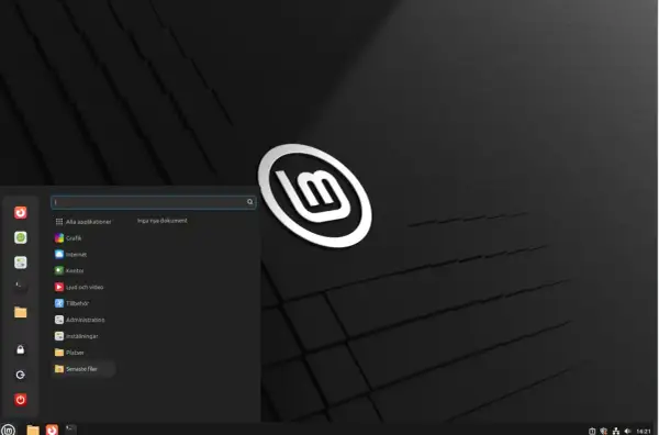 Linux operativsystem med en meny som visar applikationer som Grafik, Internet och Kontor.